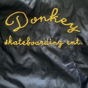 Donkey skateboarding rain jacket